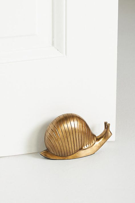 Cast aluminum Imported | Escargot Doorstop by Anthropologie in Brown Cute Door Stoppers, Wooden Door Stops, Bhldn Weddings, Door Stopper, Humble Abode, Door Stop, Cast Aluminum, Where The Heart Is, Little House