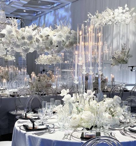 Mar 25, 2023 - This Pin was discovered by Mami Kanu. Discover (and save!) your own Pins on Pinterest Platinum Wedding Decor, Candlebra Centerpiece, White And Silver Wedding Decorations, White Theme Wedding, Silver Wedding Reception, Wedding Reception White, Silver And White Wedding, White And Silver Wedding, Wedding Glamour