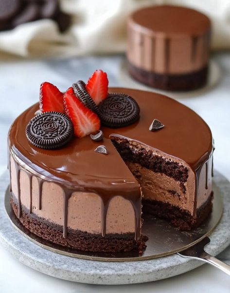 This post may contain affiliate links learn more     Oreo Chocolate Mousse Cake is a decadent, no-bake dessert perfect for any chocolate lover. It features a crunchy Oreo cookie base ... Read more Oreo Chocolate Mousse Cake, No Bake Chocolate Mousse Cake, Chocolate Cake Mousse, Chocolate Mousse Cake Recipe, Cookie Base, Oreo Chocolate, Chocolate Mousse Cake, Bake Dessert, Oreo Cookie