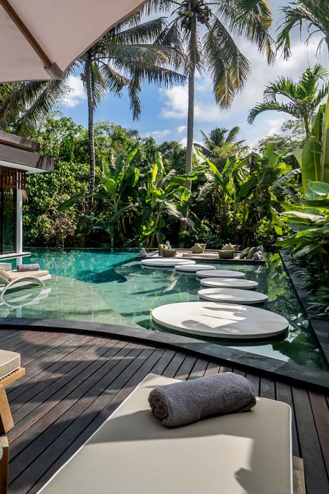 Situated peacefully in the heart of a lush jungle paradise, our luxurious 4-bedroom villa offers a stunning backdrop for your dream vacation. 🌴🏡  Book now and have a memorable Bali experience that will last a lifetime! @alfredinbali 🙌  🛏️ 4 Bedrooms 🛁 4 Bathrooms 📍 Ubud, Bali  #alfredinbali #VillaGabrielle Bali Experience, Sunken Lounge, Jungle Paradise, Ubud Villas, Bali Retreat, Lush Jungle, Tropical Luxury, Outdoor Pool Area, Vacation Villa