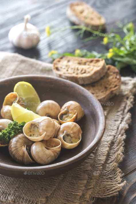 Portion of cooked snails by Alex9500. Bowl of cooked snails Snails Recipe, Food Photo, Stuffed Mushrooms, Bread, Diet, Bowl, Baking, Wall Decor, Architecture