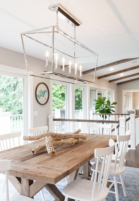 20 Bright & Beachy Dining Room Designs - Using natural elements inspired by the sea you can create a fun, joyful and bright space for entertaining and dining. | Heartenedhome.com #beachstyle #diningroom #breakfastnook #kitchendesign #beachhouse #Coastalkitchen #coastaldecor Coastal Dining Room Table, Beachy Dining Room, Coastal Farmhouse Dining Room, Beach House Dining Room, Beach Dining Room, Ikea Linnmon, Farm House Dining Room, Coastal Dining Room, Coastal Dining