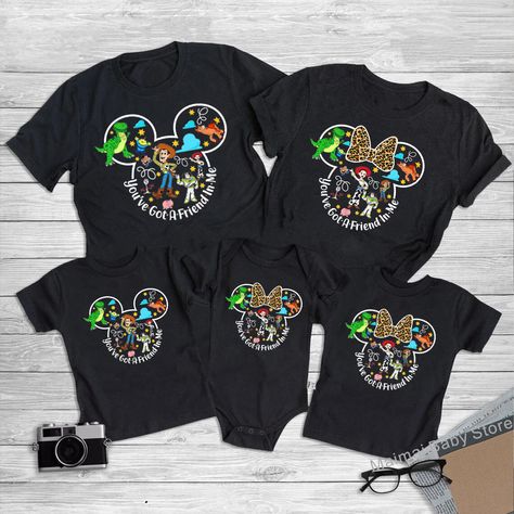 Make your Disneyland 2024 trip a real blast with these new Toy Story matching Disney family shirts! Featuring everyone's favorite characters - Woody, Buzz, Mickey & Minnie - these comfy tees are bursting with fun and "You've Got a Friend In Me" vibes. Perfect for adults, kids, and the whole crew! Free Shipping! Hashtags:  #disneyfamily #di#disneyvacation #matchingfamilyshirts #toystory #toystory4 #buzzlightyear #woody #mickeymouse #minniemouse #disneyfun #disneystyle #familyshirts #freeshipping Friends Disney Shirts, Family Shirts For Disney, Disney World Shirt Ideas, Family Vacation Outfits, Toy Story Shirts, Shirts For Disney, Family Disney Shirts Matching, Disney World Shirt, Disneyland Family