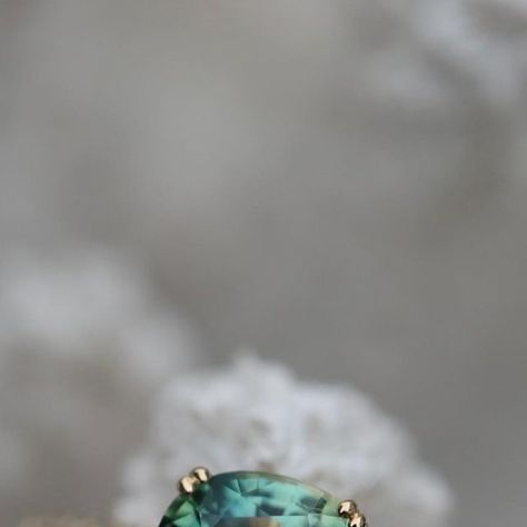 Nangi Fine Jewelry🇳🇴 on Instagram: "This color.. 🥹 An absolutely stunning 1,32 carat oval, green sapphire set in our east-west setting with double prongs. This setting ensures that the gemstone is placed in an unconventional orientation on the ring band, giving the ring a very modern and unique look! Moreover, the gorgeous sapphire is surrounded by 14 sustainable lab-grown diamonds💎 #Sapphire #EastWest #EastWestRing #EsatWestGemstoneRing #GreenSapphireRing #EngagementRing #Forlovelsesring # Green Sapphire Ring, Green Sapphire, Secret Obsession, East West, Ring Band, Lab Grown, Lab Grown Diamonds, Band Rings, Sapphire