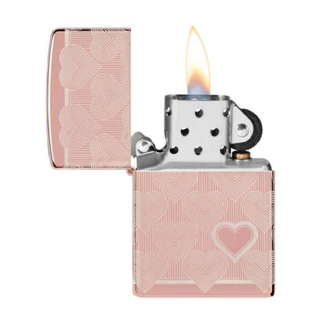 Treat your sweetheart - or yourself - to this luxurious and lovable High Polish Rose Gold lighter. The repeating heart design wraps the entire surface using our Laser 360° process and features a bold heart on the lighter's face. Comes packaged in a gift box. For optimal performance, fill with Zippo lighter fuel. Genuine Zippo windproof lighter with distinctive Zippo "click" All metal construction; windproof design works virtually anywhere Refillable for a lifetime of use; for optimum performance Ella Core, Cool Lighters, Windproof Lighter, Zippo Lighter, Puff And Pass, Gold Light, Christmas 2024, Heart On, Knick Knacks