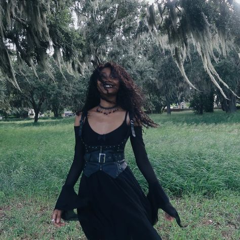 Something's haunting me 🖤 Aiming for a southern gothic vibe, I mean look at the Spanish moss! Funny story when I was a kid I used to wrap it around my neck like a scarf, and pretend to be a chic fashion model. 😂 Yes it did cause a rash, so don't be like me. I hope you're all having a day as beautiful as you are! 🖤 Dress and corset; @killstar Shoes; @tuk_footwear Choker; Claire's years ago Wig details; @wigdealer exotic curly in 18in Tags; #killstarclothingco #wewearkillstar #altgirlso... Latino Goth, Tuk Footwear, Black Goths, Killstar Shoes, Dress And Corset, Choker Outfit, Afro Goth, Alt Goth, Gothic Chokers