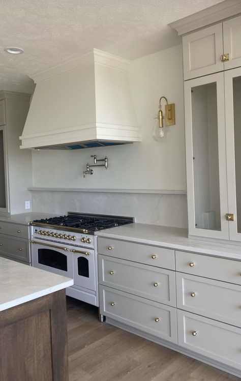 Stove Hood Between Windows, Sconces On Sides Of Range Hood, Cabinet Hood Design, Vent Hood Between Windows, Plaster Hood Kitchen, Sconces In Kitchen, L Shape Kitchen, Tiny Cottage Kitchen, Kitchen Hood Design