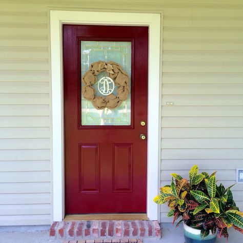 DIY I see a black door and I want it painted red! Painted Wild Currant by Sherwin Williams. Love our new door color! Wild Currant Sherwin Williams, Clay Cottage, Small Porch Ideas, 2024 Colors, Small Porch, Red Front Door, Carriage Doors, Door Colors, Home Exterior Makeover