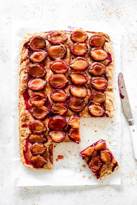 This delightful Plum Sheet Cake is a nod to German Plum Cake or Pflaumenkuchen! This version is AIP, paleo and vegan, soft, not too sweet, delicious and oh so pretty! German Plum Cake, Aip Treats, Vegan Paleo Recipes, Aip Desserts, Aip Paleo, Sheet Cake Recipes, Autoimmune Protocol, Plum Cake, Paleo Treats