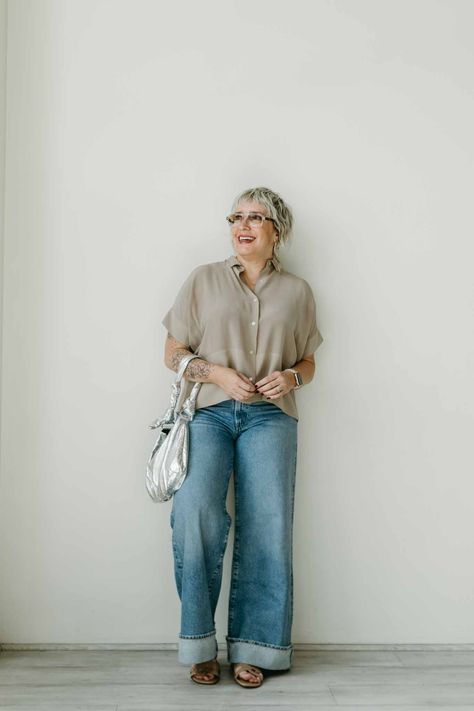 Little details like a big cuff on a jean, a little shine on a bag, a boxy breezy shirt instead of a fitted one…Simple but not boring. Full outfit details & how I'm styling these cuffed wide-leg jeans, on the blog. | #TheMomEditStyle #HowToStyleCuffedJeans #CuffedJeans #WideLegJeans #Agolde #OutfitInspo #OutfitIdeas #SpringStyle #SpringOutfit #StripedVest #DenimBag Wide Legged Jeans Outfit, Cuffed Jeans Outfit, Wide Cuff Jeans, Wide Leg Jeans Outfits, Breezy Shirt, Wide Leg Jeans Outfit, Wide Legged Jeans, Midsize Outfits, Jeans Outfit Women