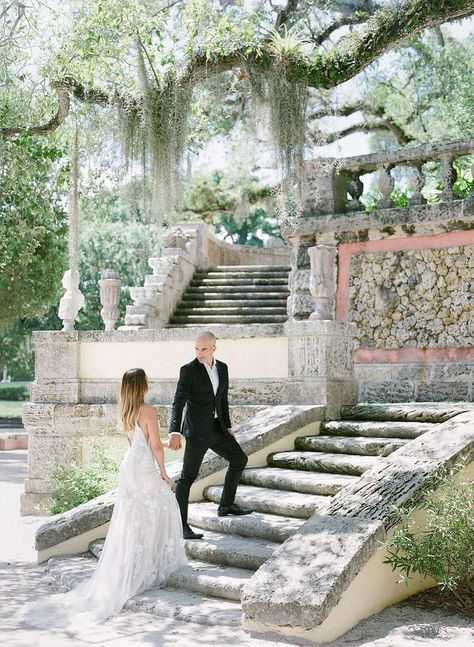 Vizcaya Museum and Gardens made for a dream backdrop for this editorial shoot recently featured in Bajan Wed. A dream location filled with spanish moss, stone stairways and beautiful arches. The bride wore a stunning Lillian West gown complete with a stunning flower head-piece. We wanted to bring back some edge to wedding imagery making […] Vizcaya Wedding, Vizcaya Museum And Gardens, Vizcaya Museum, Editorial Wedding Photography, Lillian West, Iconic Weddings, Editorial Shoot, Editorial Wedding, Garden Photography