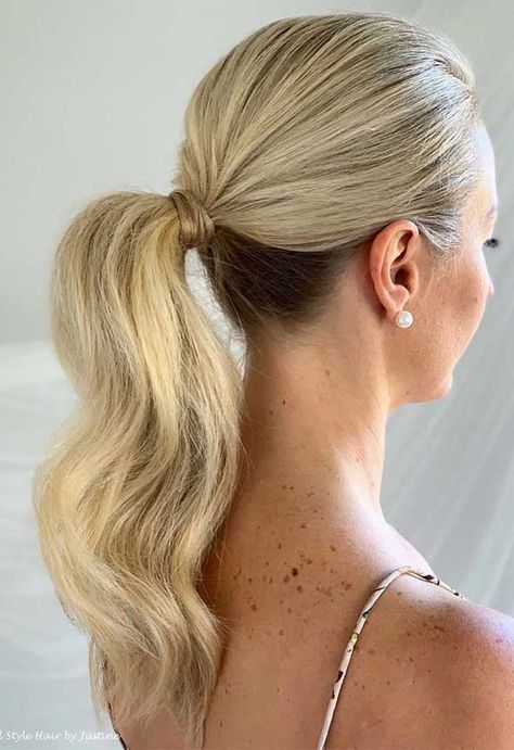 If you read this and thought, really? Ponytail? Is it really? YES!!! You know Ponytails aren’t reserved solely for bad hair days or on your fitness. Ponytail is the... Slick Ponytail Bridesmaid Hair, Ponytail Hairstyles For Wedding Guest, Slick Bridal Ponytail, Black Tie Ponytail Hairstyles, Chic Bridal Ponytail, Formal Slick Back Ponytail, Slick Wavy Ponytail, Sleek Ponytail Updo, Sleek Bridal Ponytail