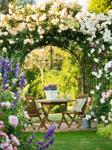 A romantic rose-covered arbor makes this elegant patio a show-stopper. Find more beautiful arbors: http://www.bhg.com/gardening/landscaping-projects/landscape-basics/arbors-and-trellises-in-the-landscape/?socsrc=bhgpin071012#page=2 Diy Arbour, Garden Arbor, Secret Gardens, Have Inspiration, The Secret Garden, Romantic Garden, Garden Gate, Climbing Roses, Gorgeous Gardens