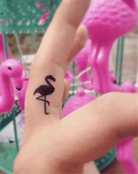 Flamingo Finger Tattoos Flamingo Matching Tattoo, Flamingo Finger Tattoo, Pink Finger Tattoo, Tiny Flamingo Tattoo, Small Flamingo Tattoo, Simple Flamingo Tattoo, Flamingo Tattoos For Women, Flamingo Tattoos, Dancer Tattoo