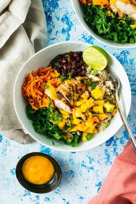 This recipe for Mango Chicken Bowls was inspired by our favorite protein bowl from a local eatery called Modern Market and incorporates juicy grilled chicken, sauteed shredded sweet potato, garlic black beans, a quinoa-brown rice mixture, and bright pineapple mango salsa. This Caribbean-esque bowl is deliciously fresh and bursting with summery flavors. #mangochicken #chickenbowl #mangosalsa #healthychicken #mangochickenbowl #chickenrecipes Shredded Sweet Potato, Pineapple Mango Salsa, Mango Dressing, Juicy Grilled Chicken, Protein Bowl, Pressure Cooker Rice, Sweet Potato Bowls, Modern Market, Grilled Chicken Tenders