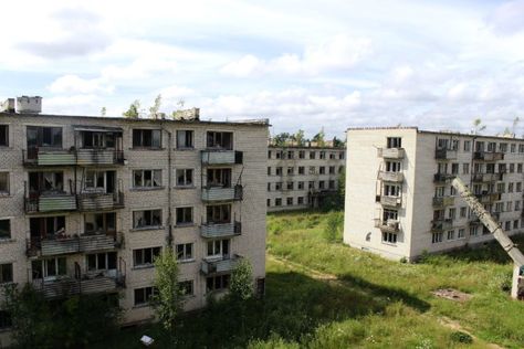 Skrunda-1 – Secret & Closed Soviet Ghost Town in Latvia - Abandoned Spaces Soviet Building, Soviet Buildings Architecture, Abandoned City, Brutalist Architecture Eastern Europe, Abandoned Town, Military Training, Ukraine Buildings Destroyed, Abandoned Soviet Buildings, Country Signs