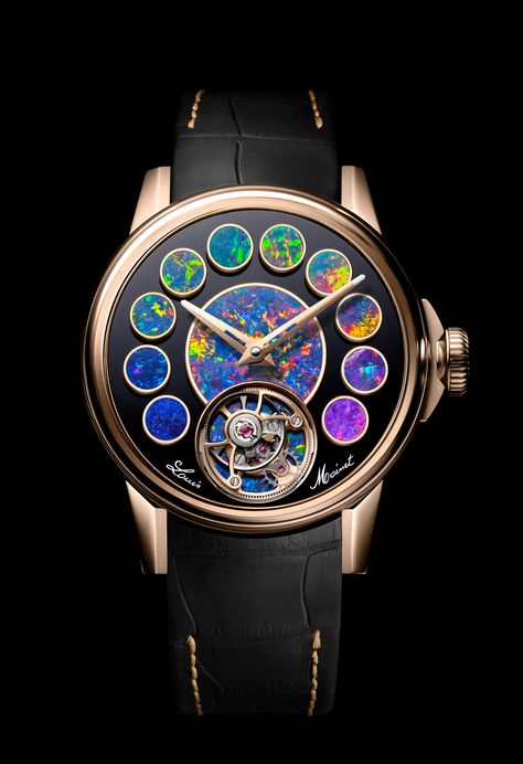 The Louis Moinet Geopolis Opal comes on the back of last year’s Cosmpolis model, an exceptional watch with a dial incorporating 12 meteorites, the ‘most meteorite inserts in a watch’. On this occasion, the Geopolis Opal swaps said meteorites for the eponymous rainbow-evincing stones. Mark McArthur-Christie provides an insight into the making of this watch, a product of love not ego. #louismoinet #saintblaise#flyingtourbillon #jeanmarieschaller Saint Blaise, Laurent Ferrier, Louis Moinet, Watch Review, Expensive Watches, Book Jewelry, Rainbow Colours, Light Of The World, Watches Unique