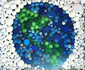 I am so exited about our Earth Day project!  The Environmental Club created this mosaic out off recycled bottle caps to show at the Commun... Earth Day Project, Environmental Club, Diy Library, Eco Club, Plastic Bottle Tops, Games Preschool, Earth Week, Earth Day Projects, Steam Projects