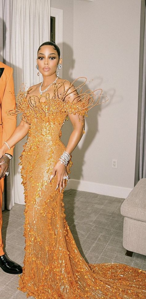 Mardi Gras Ball Gowns Black Women, Gold And Purple Prom Dress, Mardi Gras Ball Gowns, Nigerian Prom Dress Gold, Met Gala Gilded Glamour, Gilded Glamour Met Gala 2022, Orange Cocktail Dresses, Off Shoulder Evening Dress, Met Gala Outfits