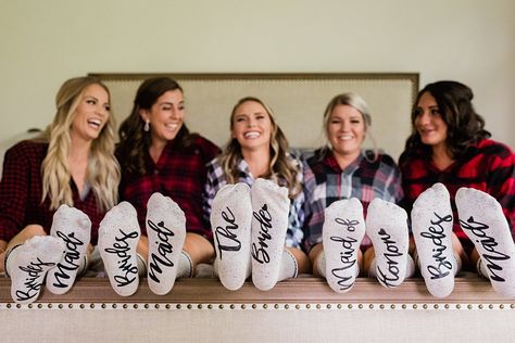 These matching flannel shirts and matching socks made perfect bridal party gifts. If you're looking for holiday nail ideas or cute trendy hairstyles for bridesmaids, check out the blog! Lodge Wedding Reception, Bridesmaid Socks, Bridesmaid Pictures, Bridal Party Getting Ready, Wedding Socks, Colorado Wedding Photography, Bridesmaids Photos, Lodge Wedding, Wedding Photography Poses