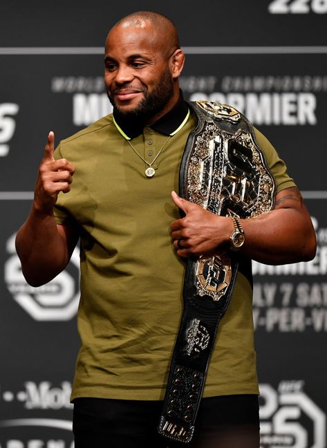 LAS VEGAS, NEVADA - JULY 05:  UFC light heavyweight champion Daniel Cormier poses for photos during the UFC 226 Press Conference inside The Pearl concert theater at Palms Casino Resort on July 5, 2018 in Las Vegas, Nevada. (Photo by Jeff Bottari/Zuffa LLC/Zuffa LLC via Getty Images) Daniel Cormier, Palms Casino Resort, Poses For Photos, Ufc, Casual Button Down Shirt, Men Casual, Mens Tops