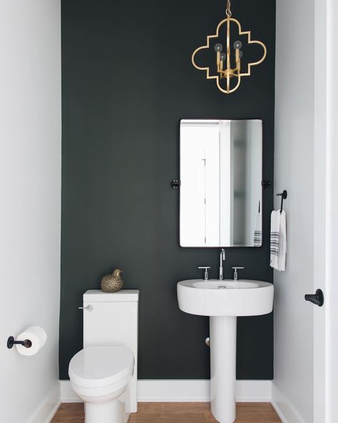 How cute is this powder room? Love the dark accent wall — what’s the perfect piece(s) for over the toilet? What would you do? 🖤🤔 Powder Room Accent Wall Ideas, Tile Accent Wall Bathroom, Room Accent Wall Ideas, Classic Powder Room, Powder Room Accent Wall, Dark Accent Wall, Shiplap Bathroom Wall, Bathroom Tiles Modern, Modern Vintage Bathroom