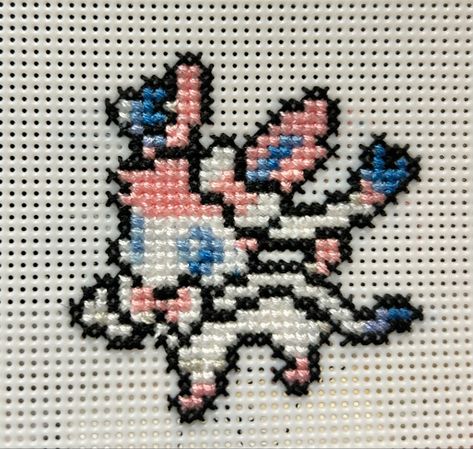 Sylveon cross-stitch; Pattern from Nonnsuke Sylveon Cross Stitch Pattern, Sylveon Cross Stitch, Sylveon Perler Beads, Pokemon Cross Stitch Patterns, Tapestry Ideas, Pokemon Cross Stitch, Stardew Valley, Cross Stitch Patterns Free, Free Cross Stitch