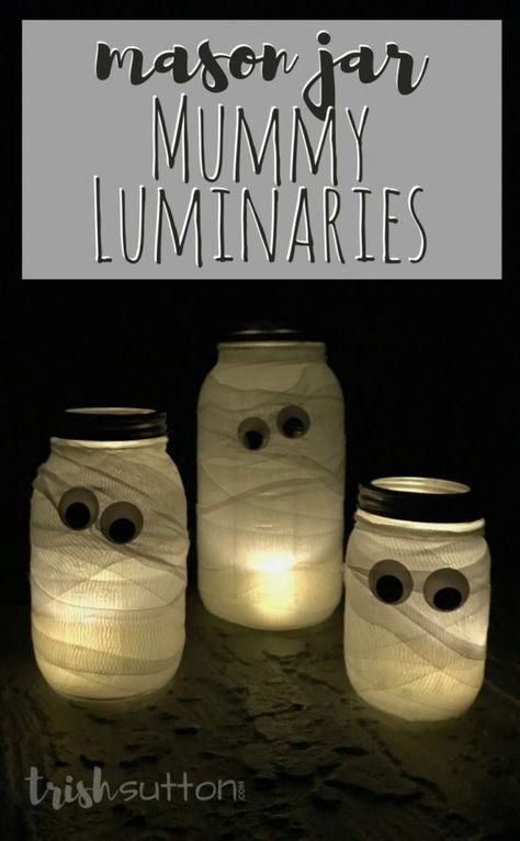 Mason Jar Mummy Luminaries are a simple and silly way to add Halloween cheer both outdoors and indoors. Along with the Mason Jars you will need a roll or two of first aid gauze and tea lights or candles. (Add my favorite battery operated tea lights and you won't even have to remember to light your mummies at night - they have timers!) TrishSutton.com Mummy Jar, Halloween Luminaries, Mason Jar Luminaries, Stag And Doe, Halloween Mason Jars, Halloween Centerpiece, Spooky Halloween Decorations, Halloween Mummy, Mason Jar Centerpieces