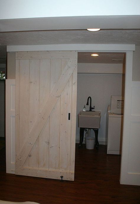 barn door using a closet track, diy, doors, woodworking projects Barn Door Basement, Basement Closet, Diy Doors, Bypass Barn Door, Basement Laundry Room, Basement Family Room, Diy Barn Door, Interior Barn Doors, Diy Door