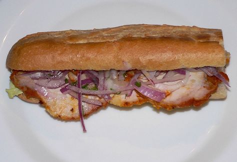 What happens when you combine a garlic-infused, ham with chillis, onions, peppers and wrap it up in crusty white bread? You get a Peruvian food favourite! Crusty White Bread, Ham Sandwich, Best Sandwiches, Peruvian Cuisine, Gourmet Sandwiches, Foreign Food, Ham Sandwiches, Veggie Sandwich, Fast Lunch