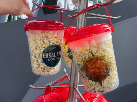 PHOTOS: Popcorn Bucket Debuts as First Merchandise With New Universal Orlando Resort Park Logos - WDW News Today Adventure Logos, Universal Islands Of Adventure, Orlando Hotel, Popcorn Bucket, Universal Studios Florida, Shanghai Disney Resort, Universal Orlando Resort, Tokyo Disney Sea, Orlando Resorts