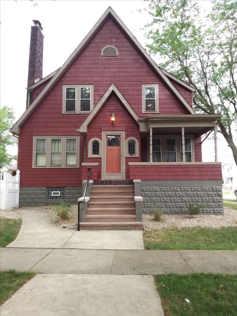 Deep Red Exterior House, Red House Trim Colors, Dark Red Exterior House, Red House Colors Exterior, Blue House Red Trim, Maroon Siding House, Red Exterior Paint Colors For House, Tan Trim Exterior House, Red Cabin Exterior