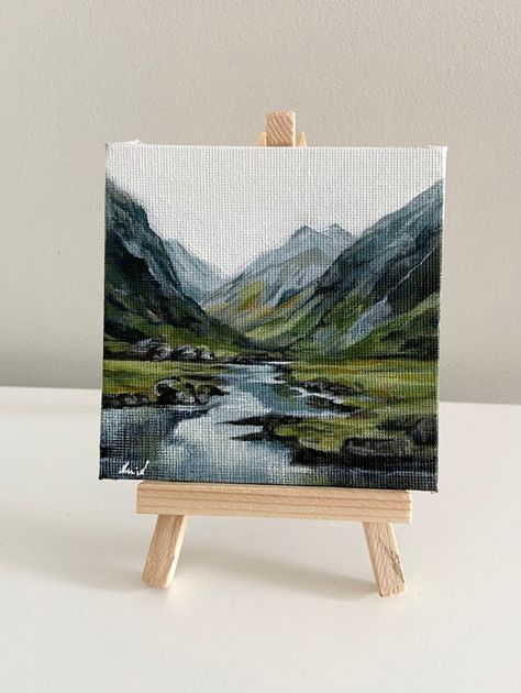 Inspired by the beauty of Ireland - this particular tiny painting has been titled "The Gap of Dunloe" and measures 4x4 inch (10cmx10cm). This is an original hand painted acrylic painting on canvas board - it is not a print .  It can be purchased with or without the mini wooden easel, and will make the perfect gift for anyone who loves the Irish landscape.  It is ready to ship and will be packaged securely, together with a tracking number, for worldwide shipping.  Free gift wrapping. Title:- The Painting On Small Square Canvas, Square Mini Canvas Painting, Acrylic On Small Canvas, Small Painting Gift Ideas, 4x6 Acrylic Paintings, Square Canvas Acrylic Painting, Small Square Painting Ideas, Mini Paintings Ideas Aesthetic, 4x4 Canvas Painting Ideas