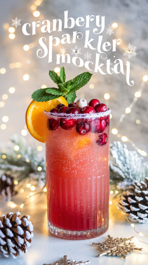 "Elevate your celebrations with this refreshing Cranberry Orange Sparkler  Mocktail! Perfect for the holidays, this festive drink recipe combines  tangy cranberry and zesty orange for a deliciously vibrant non-alcoholic  beverage. Ideal for any gathering, this easy party drink is a must-try for  those seeking sparkling mocktail ideas. Celebrate in style with this  delightful addition to your holiday mocktails collection!" Sparkling Cider Non Alcoholic, Rose Mocktails Non Alcoholic, Mocktails Torani, Festive Christmas Non Alcoholic Drinks, Fun Christmas Mocktails, Holiday Beverages Nonalcoholic, Poppi Drink Mocktails, Sparkling Cider Mocktail Non Alcoholic, Christmas Mocktails For Kids