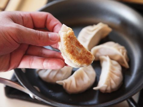 My wife Adri and I have stocked out freezer with frozen dumplings since before we were husband and wife. After years of experience, I've figured out the easiest, fastest, and best ways to cook them from frozen. Here's how. Best Dumplings, Frozen Dumplings, Dumpling Filling, Pork And Cabbage, Dumpling Wrappers, Chinese Cabbage, Dumpling Recipe, Cleaning Dishes, Ground Pork