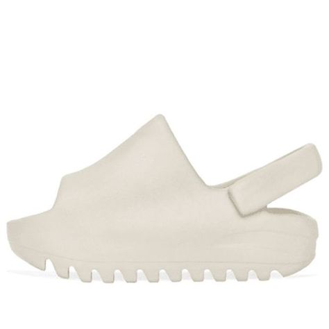 Introducing the Adidas Yeezy Slides Infant 'Bone' - perfect for your little one's summer wardrobe. Made from soft and durable foam, these slides are designed for comfort and style. The neutral hue is perfect for any outfit, while the adjustable strap ensures a secure and comfortable fit. Whether playing at the park or taking a walk on the beach, these slides are perfect for any activity. Adidas Yeezy Slides, Playing At The Park, Luxury Bag Brands, Baby Slide, Adidas Yeezy Slide, Neutrogena Makeup, Yeezy Slides, Walk On The Beach, Slides Slippers