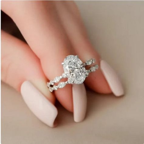 "Description of Ring ● Moissanite Details → Stone Shape: Oval Cut → Center stone carat Weight : 2 CT → Measurement: 9 x 7 mm → Stone Color: Colorless → Stone Clarity: VVS1 → Stone Luster: Excellent → Stone Make: High Quality Material: SOLID 10K/14K/18K GOLD (can be customized in white/rose/yellow gold) , Silver , Platinum ★Why to buy Moissanite over Diamond? Moissanite is pocket-friendly, it is 1/10 of the diamond price. Moissanite is Conflict-free and eco-friendly, were as a diamond can be bloo Moissanite Wedding Ring Set, Oval Moissanite Ring, Cute Engagement Rings, Future Engagement Rings, Oval Cut Engagement Ring, Detailed Engagement Ring, Moissanite Engagement Ring Oval, Oval Engagement, Bridal Engagement Rings