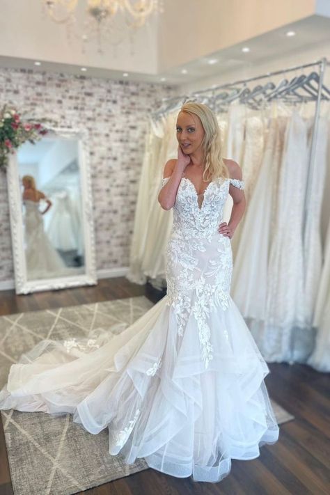 Indiana is a sexy off-shoulder mermaid wedding dress featuring a sweetheart bodice embellished with delicate sequined lace appliqués. Indiana is completed with detachable off-the-shoulder straps offering brides a stylish yet versatile look. Shown here at Modern on Market. To book your appointment, please contact the boutique via phone (937) 552-7288 or visit their website https://www.modernonmarket.com/contact-1 Haley Paige Bridal, Wedding Mermaid Dress, Wedding Mermaid, Sophia Tolli, Fairy Tale Wedding Dress, Alternative Wedding Dresses, Pretty Wedding Dresses, Layered Tulle Skirt, Dress Idea