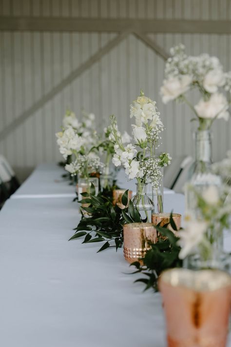 Green And White Bud Vases, Bud Vases With White Flowers And Greenery, Greenery Table Runner With Bud Vases, Single Rose Bud Vase, Spray Rose Bud Vase, White Rose Centerpieces, Bud Vases Wedding, Bud Vase Centerpiece, Rose Centerpieces