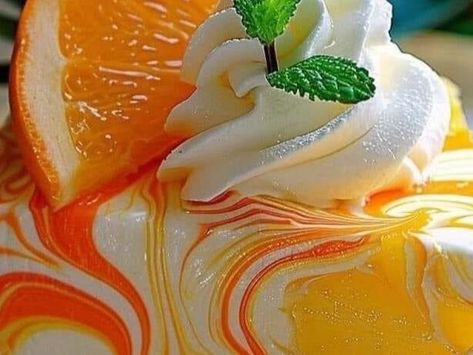 Summery Delight: Southern Pineapple Orange Swirl Cheesecake | Soul Screwed Series | NewsBreak Original Orange Pineapple Swirl Cheesecake, Shrimp Deviled Eggs, Peaches Cream Cheese, Cheesecake Base, Sour Worms, Lemon Butter Salmon, Cream Cheese Cupcakes, Swirl Cheesecake, Cheesy Grits