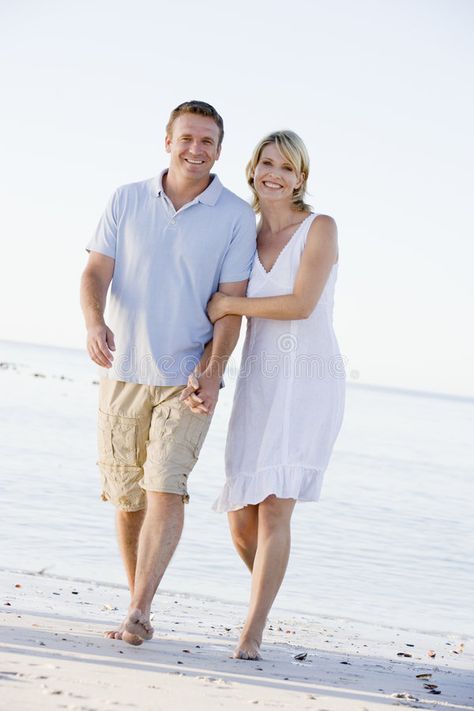 Couple Walking On The Beach. Middle aged man and woman smiling,walking and holdi , #Ad, #Middle, #aged, #man, #Couple, #Walking #ad Older Couple Photography, Couples Beach Photography, Image Couple, Beach Play, Couples Walking, Man Photography, Beach Portraits, Phase 2, Couple Photography Poses