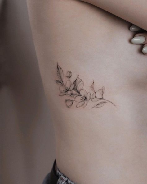 Ribcage Floral Tattoo, Magnolia Tattoo Ribs, Abdominal Tattoos Women Lower, Flower Rib Tattoo, Ankle Tattoo Ideas, Flower Hip Tattoos, Flower Tattoo On Ribs, Mum Tattoo, Magic Runes