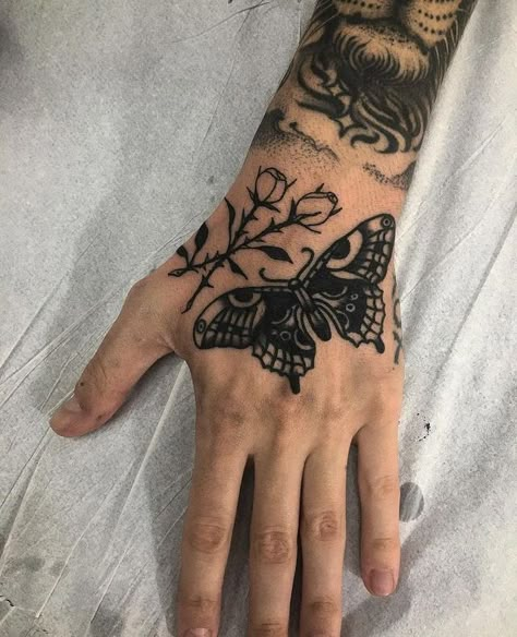 Butterfly Hand Tattoo Traditional, Traditional Tattoo On Hand, Butterfly Hand Tattoo Men, American Traditional Hand Tattoos, Butterfly Tattoo Traditional, Practice Makes Perfect Sarah Adams, Will Griffin, Butterfly Tattoo Hand, Hand Tattoos For Men