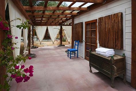 article-image Bohemian House Exterior, Korakia Pensione, Patio Curtains, California Desert, Bohemian House, Outdoor Spa, Palm Springs California, Reception Area, Beach Bungalows