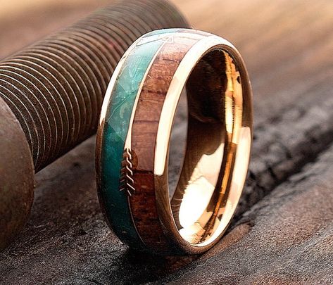 Simple and elegant, this 8mm Dome Shaped Rose Gold Plated Tungsten with Wood and Green Malachite Inlay, will seal your vows on your wedding day. The ring is available from size 5 to 15. The inside of the band is rounded for Comfort Fit. This exquisite ring is a great addition to any attire. It can be worn as a Friendship Ring, Promise Ring, Engagement Ring and Wedding Band.* Width -  8mm* Material - Tungsten Carbide, Rose Gold Plating, Wood, Green Malachite  * Sizes - 5 to 15* Finish - Polished* Green Wedding Band, Green Wedding Rings, Pretty Wedding Rings, Wood Engagement Ring, Wooden Wedding Bands, Wooden Wedding Ring, Wedding Ring For Him, Wood Wedding Ring, Wood Wedding Band