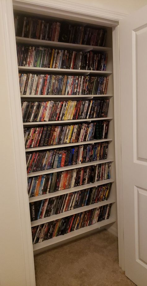 Floating Dvd Shelves, Movie Library Room, Dvd Storage Ideas Aesthetic, Media Closet Ideas, Movie Shelf Ideas Dvd Storage, Dvd Shelf Aesthetic, Dvd Shelf Ideas, Cd Shelf Aesthetic, Dvd Bookshelf