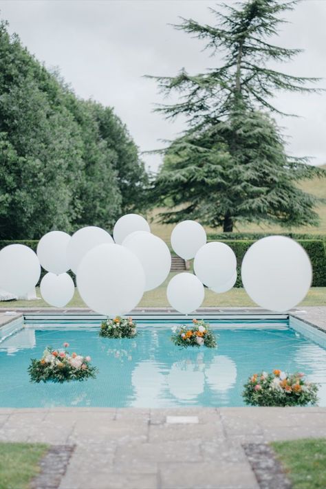 Weekend Wedding Pool Brunch | Findon Place | Luxury Wedding Planner | In Awe Weddings & Events Wedding Pool Balloons, White Balloons In Pool, Balloons In Pool Decor, Floating Balloons In Pool, Floating Brunch, Balloons In Pool, Luxury Pool Party, Pool Brunch, Balloon Lanterns