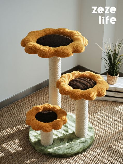 This vibrant orange cat tree blooms with sunflower accents, offering pets soft perches, durable scratching posts, dangling toys and stepped platforms to play, climb, and relax within a decoratively elegant indoor oasis. Colorful Cat Tree, Cats Tree Diy, Diy Cat Tree Homemade, Cat Toy Ideas, Cat Toys Aesthetic, Cute Cat Tree, Diy Cat Scratching Post, Sunflower Orange, Cute Cat Stuff