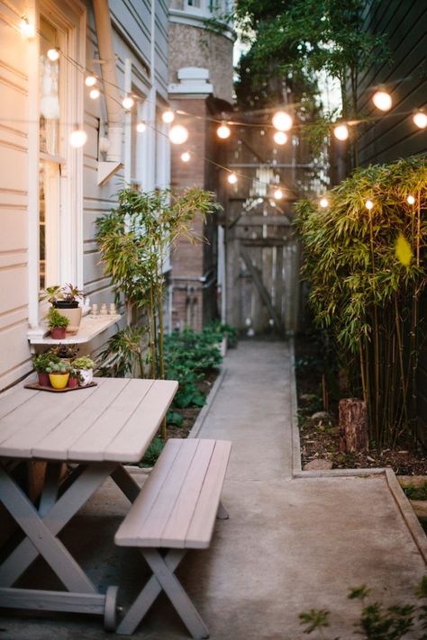 Backyard landscaping ideas cafe lights ; Gardenista Shed Inspiration, Cosy Garden, Design Per Patio, Herb Wall, Serene Garden, Side Yards, Patio Interior, Small Outdoor Spaces, Have Inspiration