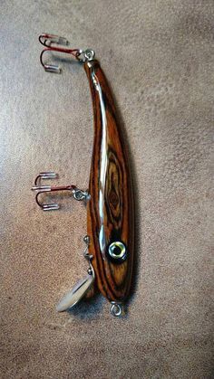 Gorgeous wooden fishing lure #saltwaterfishing Fishing | Fishing tips | Fishing gear | Fishing hacks | Fishing lures | bass Fishing | Fly Fishing | SAltwater Fishing | Freshwater Fishing | Fishing knots | Salmon fish | #Fishing #FishingTips #FishingGear #FishingHacks #FishingTures #BassFishing #FlyFishing #SAltwaterFishing #FreshwaterFishing #FishingKnots #SalmonFish #freshwaterfishingtip  Gorgeous wooden fishing lure #saltwaterfishing Fishing | Fishing tips | Fishing gear | Fishing hacks | Fish Fishing Freshwater, Fishing Hacks, Saltwater Fishing Lures, Homemade Fishing Lures, Diy Fishing Lures, Diy Fishing, Fly Fishing Tips, Bass Fishing Lures, Bass Fishing Tips